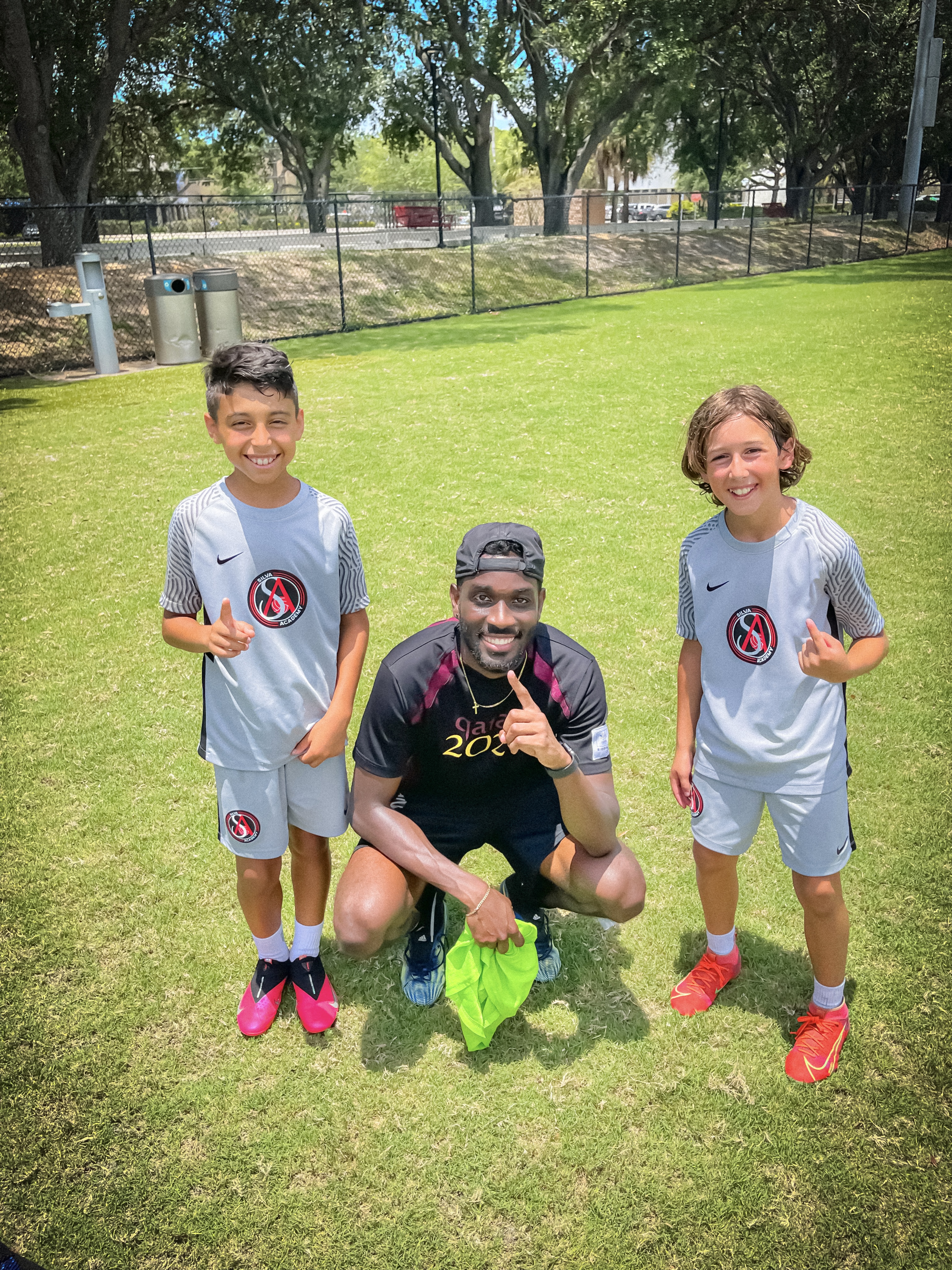 Caleb coaching young players
